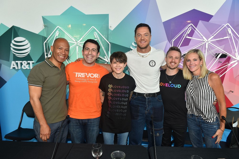 LOVELOUD 2018 partners photograph, Dan Reynolds with representatives from The Trevor Project, Encircle, and AT&T at the festival press conference.