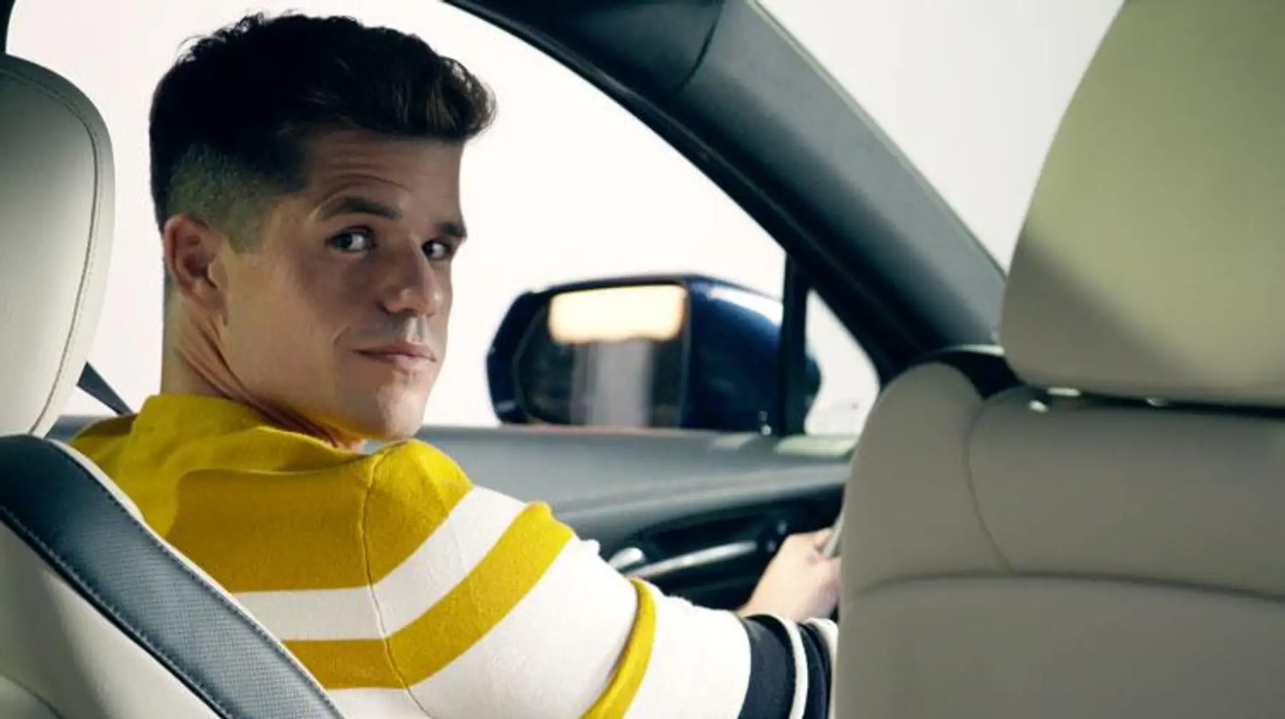 Charlie Carver at the wheel of the Cadillac XT4.